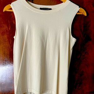 Two piece due to Charles cream coloured sweater set